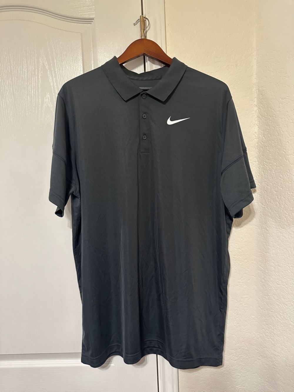 Nike Men’s Charcoal Gray Polo with White Swoosh